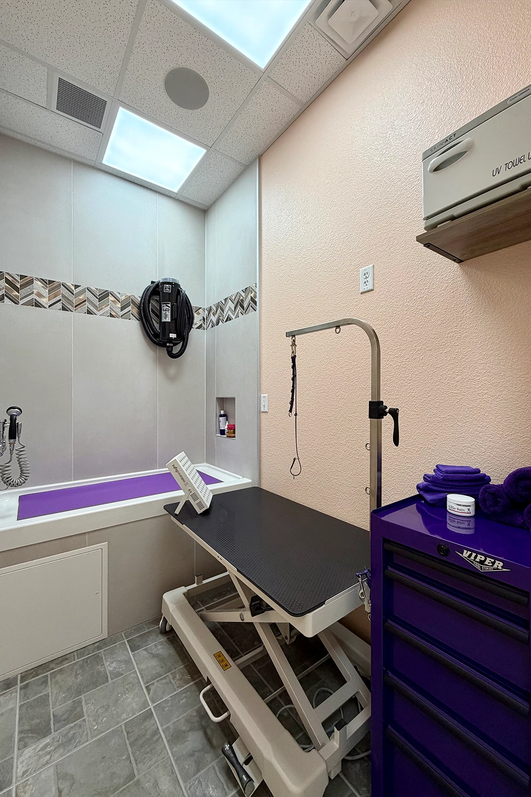 Private dog grooming suite at Fur-Bae Dog Salon & Spa designed for calm, one-on-one bathing and grooming appointments.
